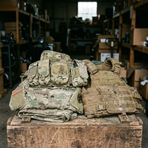 Modern military tactical gear including modular MOLLE vests, camouflage combat uniforms, and plate carriers.