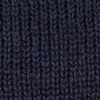 Detailed macro texture shot of 100% British wool navy blue knit yarn
