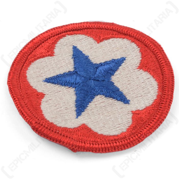 Side angle showing thick embroidery and red outer trim on US Army Service Forces patch