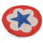 Side angle showing thick embroidery and red outer trim on US Army Service Forces patch