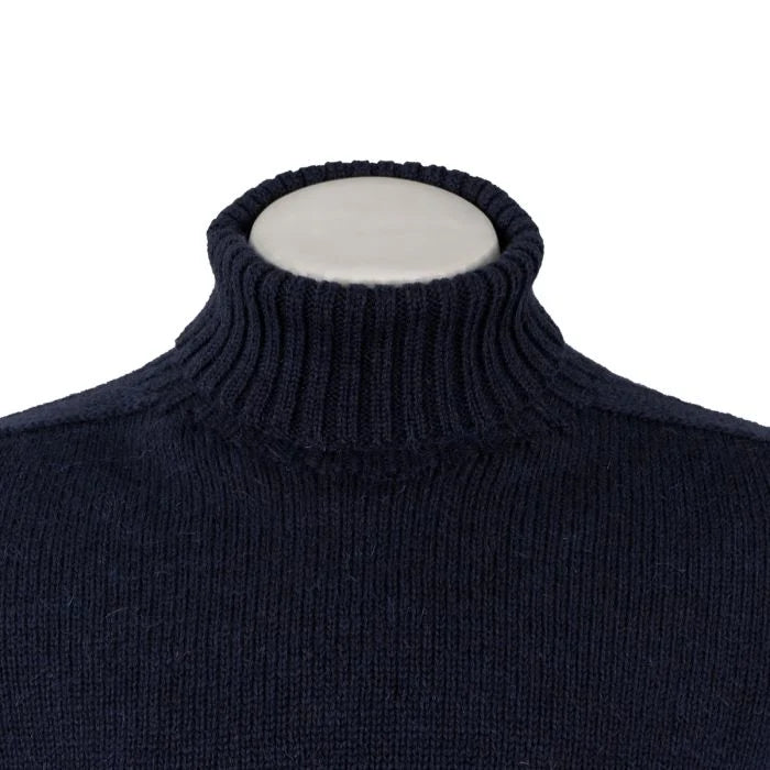 Close-up of thick ribbed turtleneck collar on navy blue British wool jumper