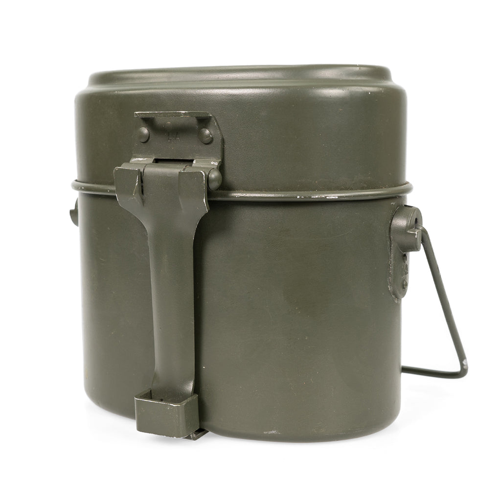 Fully assembled Austrian Army mess tin set viewed from the side, showing the folding steel handle and classic kidney-shaped military design.
