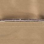 Close-up of brown and white checkered piping on a vintage WW2 US Army Khaki Garrison Cap.