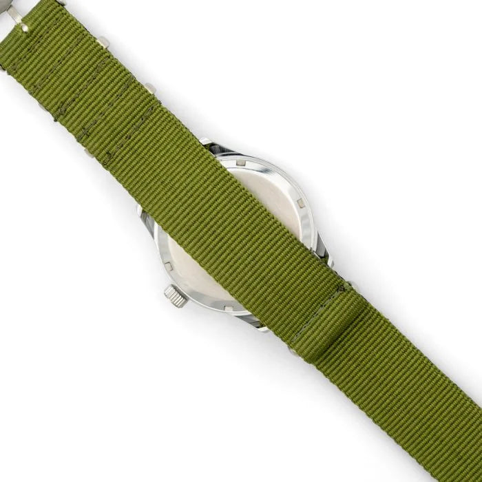 Angled rear view of the British ATP Service Watch case back and pass-through strap
