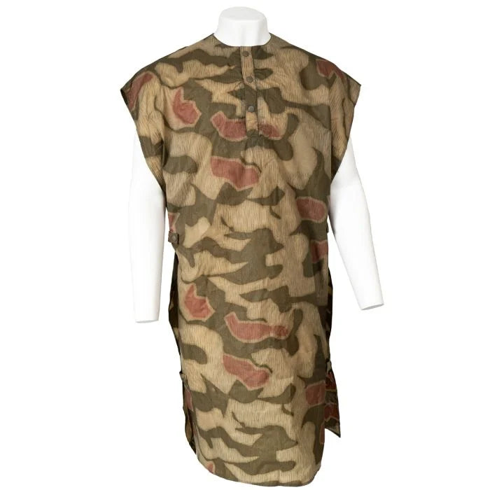 Front view of the original German Border Police BGS Sumpftarn camouflage poncho on a mannequin.