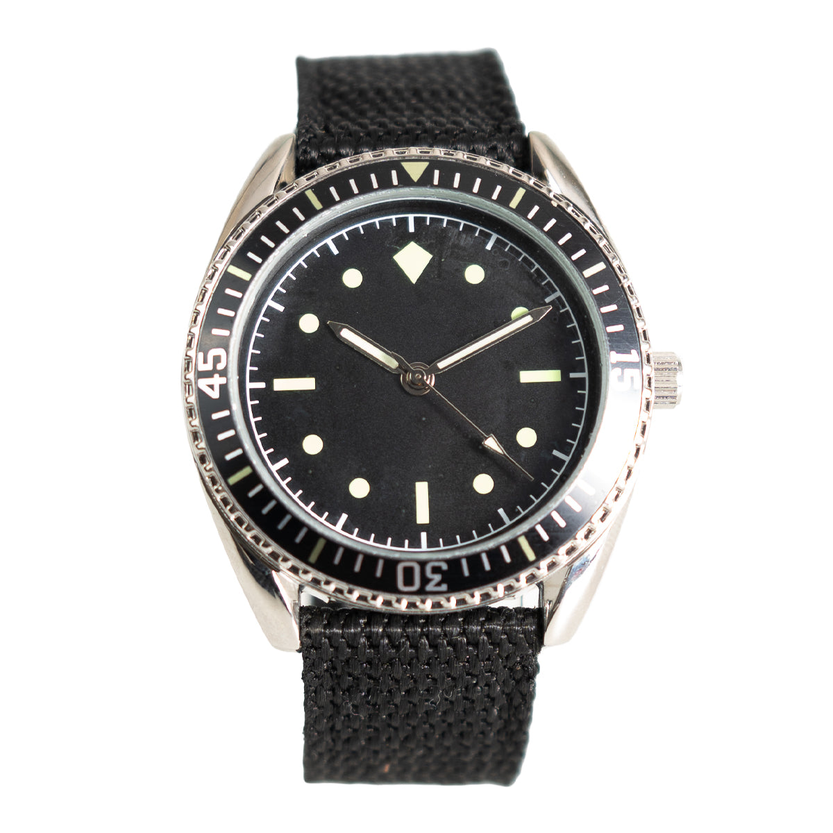 1960s German Naval Commando style watch with a black dial, luminous markers, fluted bezel, and black woven nylon strap.