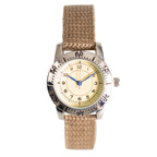 1940s US Airman military watch replica with beige dial, bold black numerals, blue steel-style hands, and a rotating bezel on a brown canvas strap.