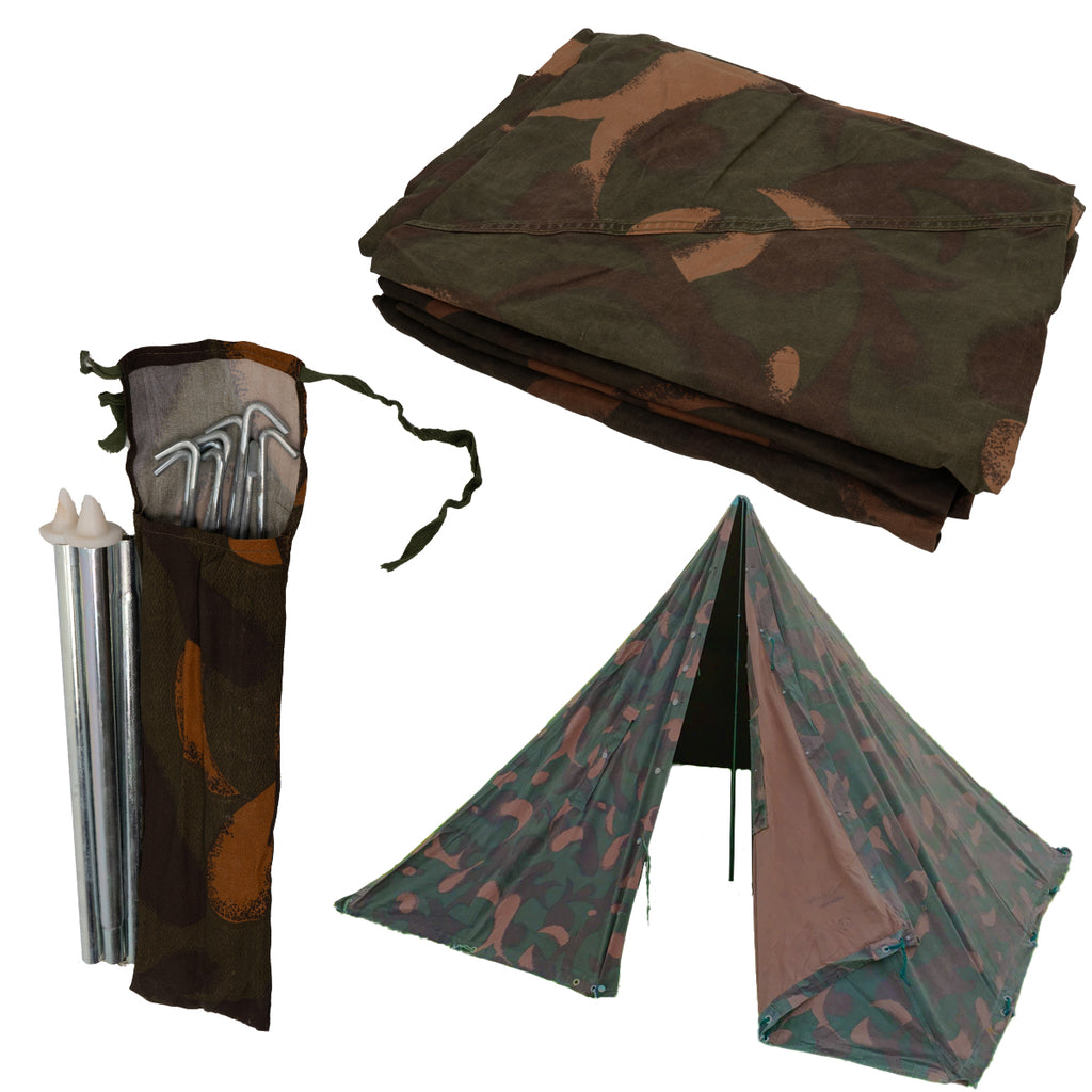 A collection of the Hungarian M82 Zeltbahn set including two folded canvas sheets, tent poles, and stakes.