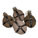 Collection of four vintage Czech M60 military canteens with felted wool covers and black leather straps.