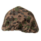 Austrian M75 helmet cover displaying the brown-dominant K4 Fleckerlteppich pea-dot camouflage pattern.