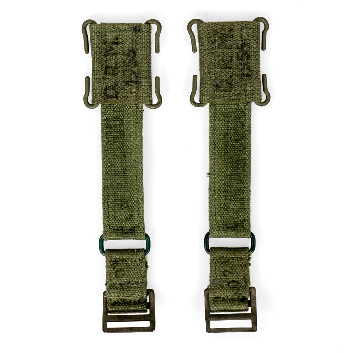 Full pair of genuine 1950s British Army 44 Pattern webbing brace extenders in olive drab cotton canvas with visible markings.