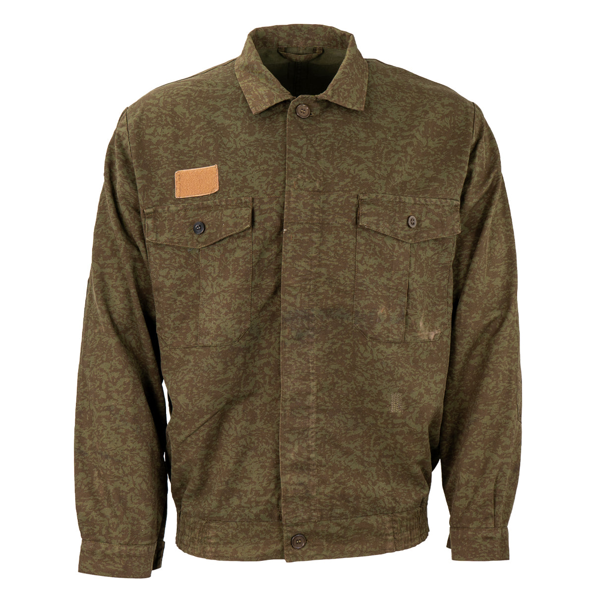 Front view of an authentic Czech M92 field jacket in woodland camouflage with button-down front, chest pockets, and a rectangular patch.