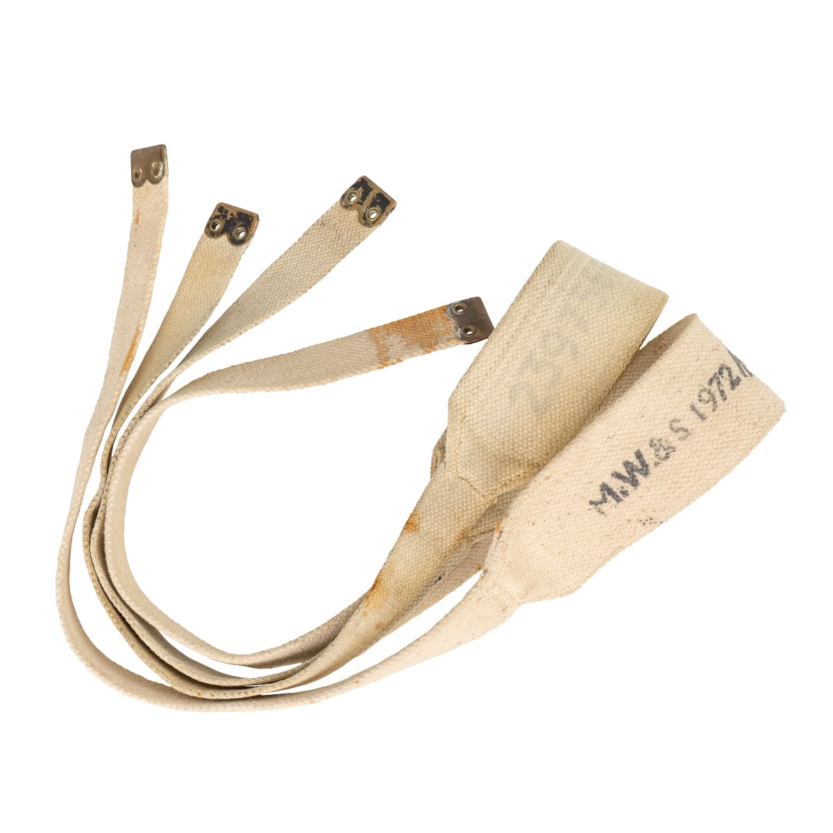 Off-white British 37 Pattern cross straps with brass buckles and legible unit markings, showing historical wear.