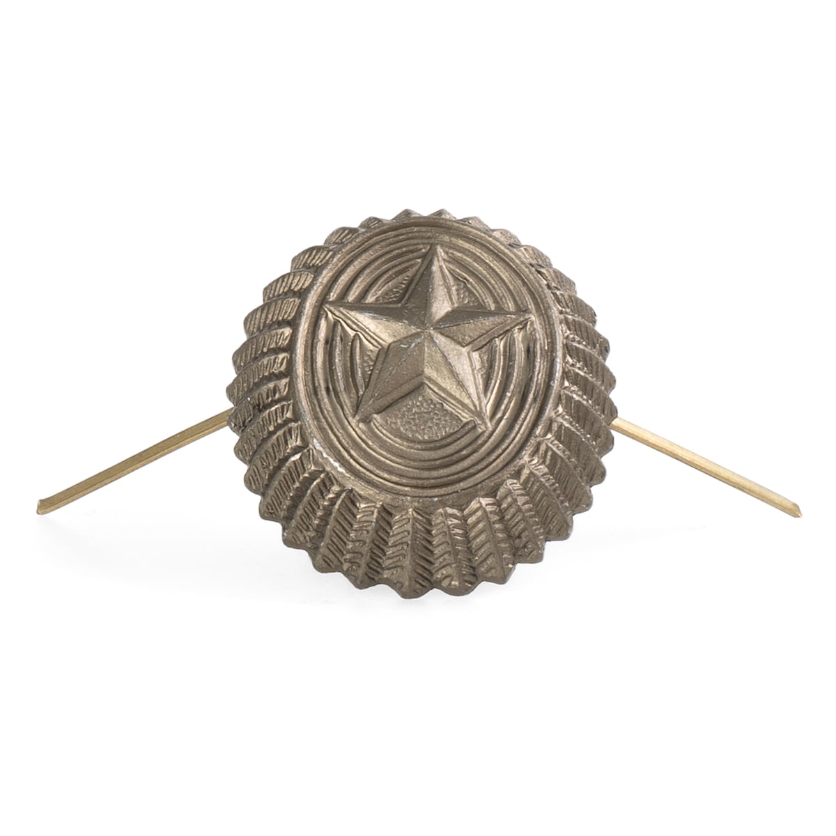 Metallic star-shaped object with ribbed texture on a white background