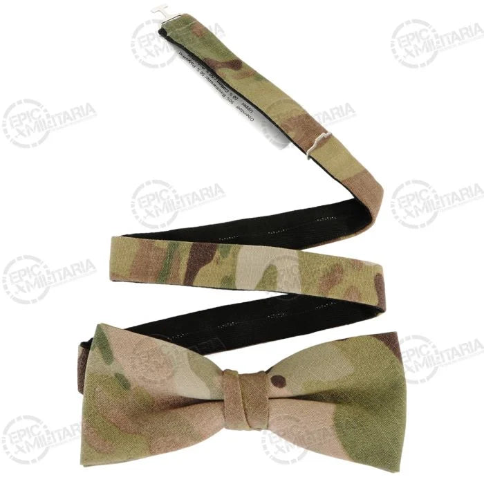 MultiCam style pre-tied camouflage bow tie showing fabric tag and adjustment strap