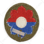 Back view of original US 9th Infantry Division patch showing thread stitching