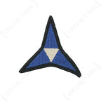 Front view of blue and white embroidered US III Corps caltrop patch