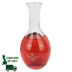 Italian Air Force water carafe filled with red liquid showing etched eagle insignia