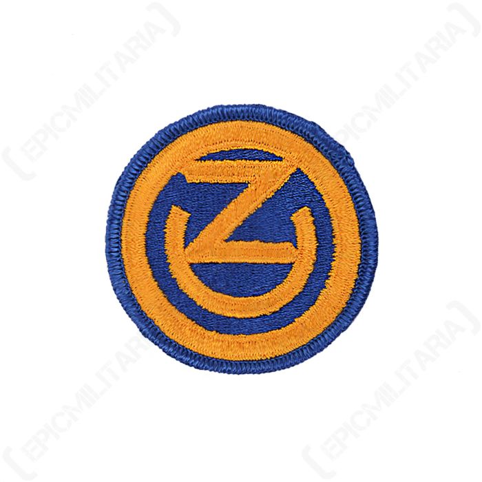 Front view of original US Army 102nd Infantry Division Ozark patch with blue background and gold embroidered emblem