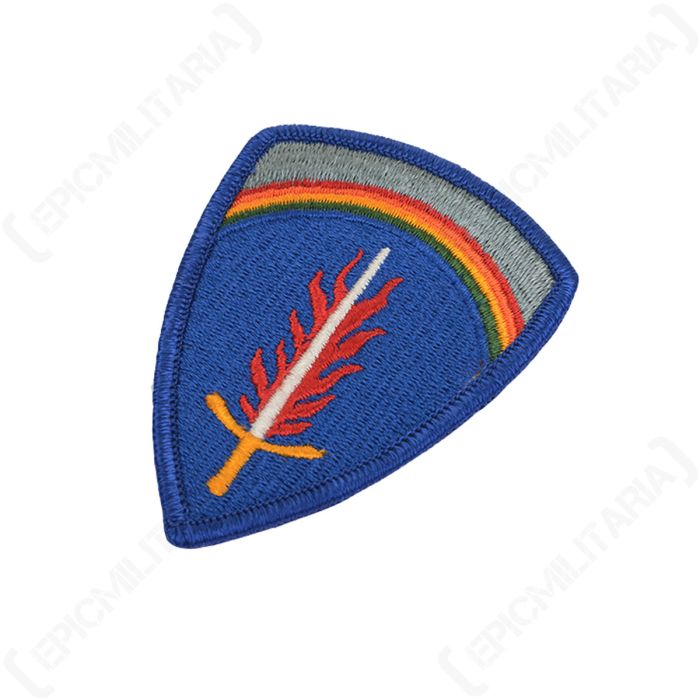 Angled view of the US Army Europe shoulder sleeve patch showing blue shield background and embroidered border.