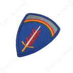 Angled view of the US Army Europe shoulder sleeve patch showing blue shield background and embroidered border.