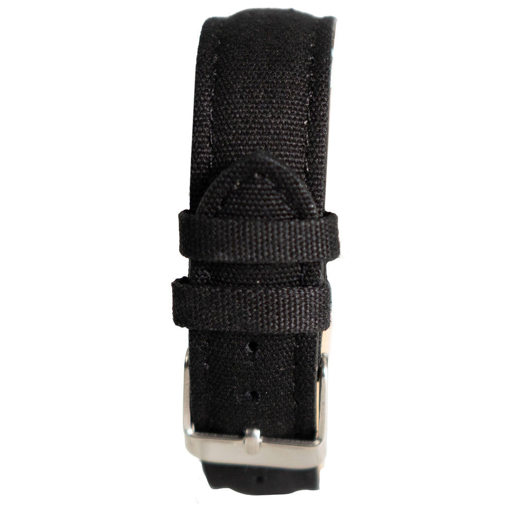 Detail of the adjustable black canvas watch strap showing the sturdy construction and metallic silver-tone pin buckle.