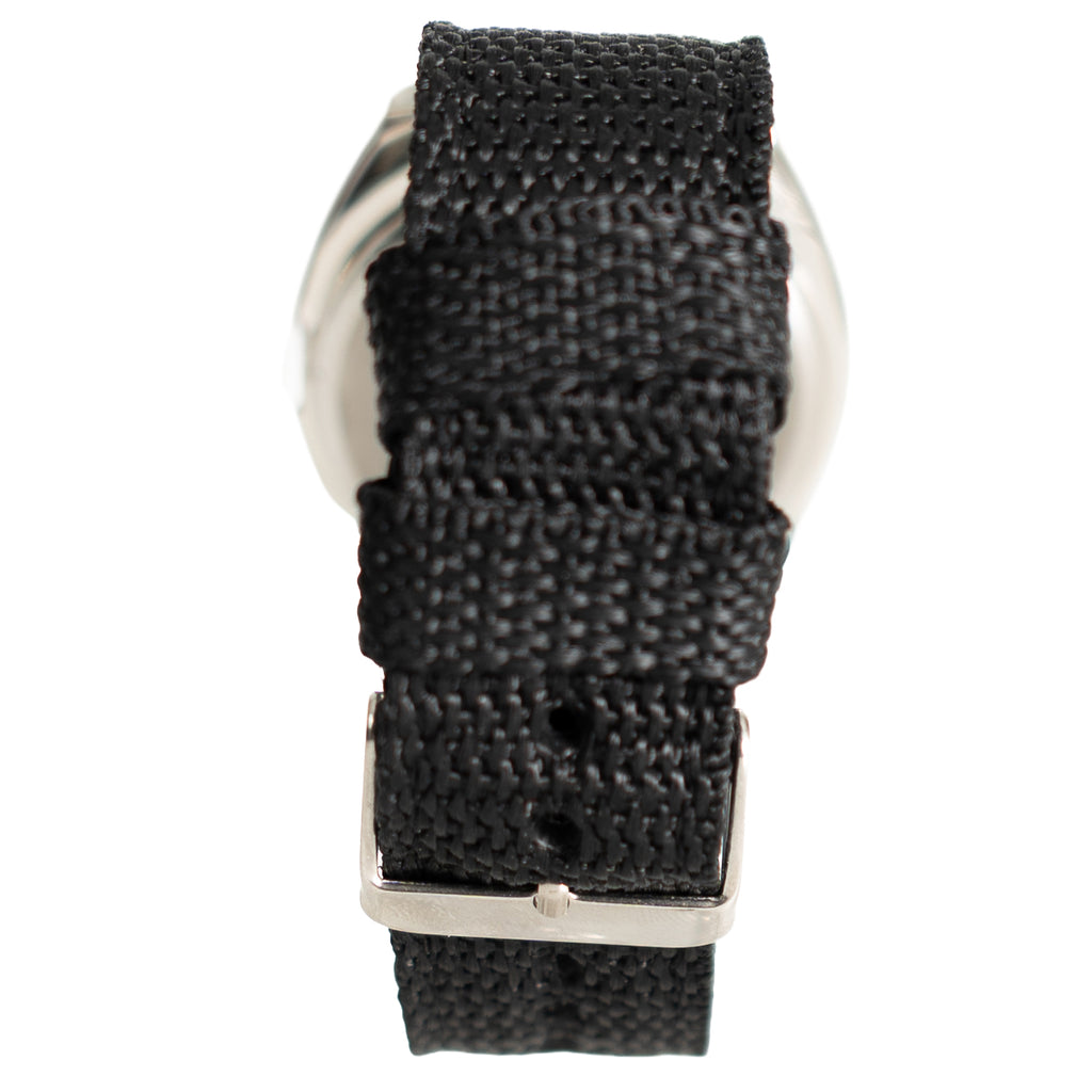 Close-up of the adjustable silver buckle on the rugged black woven nylon strap of the Eaglemoss military watch.