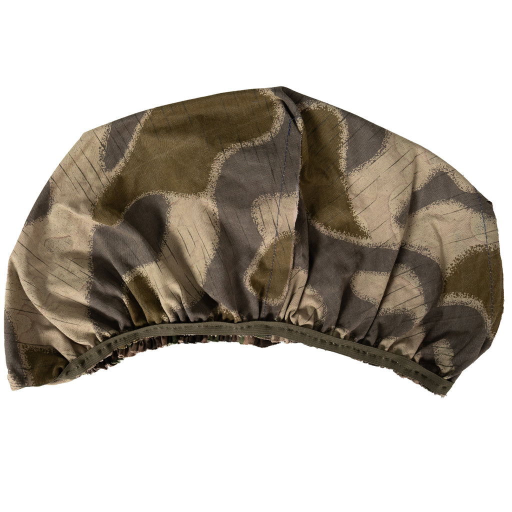 Reverse side of the M75 cover showing the rocky alpine Steintarnung stone camouflage pattern and elastic hem.
