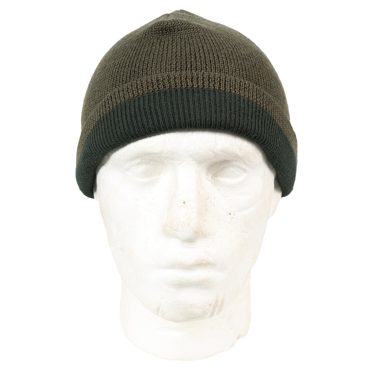 Austrian Army wool beanie worn as a folded watch cap on a mannequin head, showing the olive drab knit and contrasting dark green brim.
