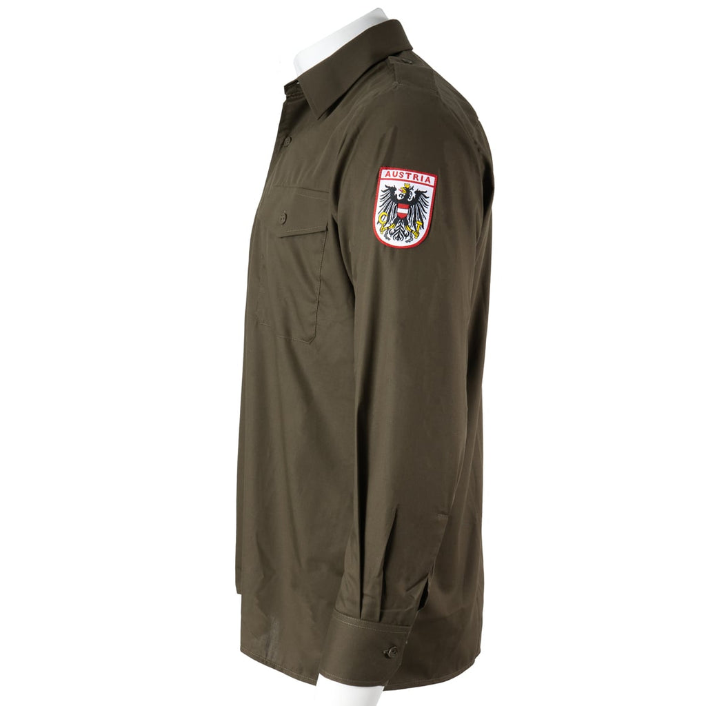 Side profile of the Austrian Army field shirt showing the red-and-white federal coat of arms patch on the sleeve.