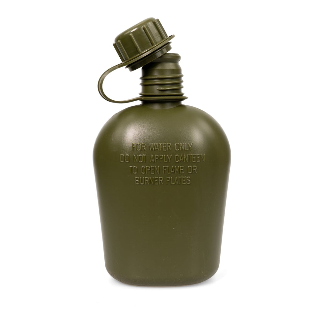 Close-up of a Belgian military 750ml plastic water bottle with a screw-on cap and integrated retaining strap, showing embossed safety text.