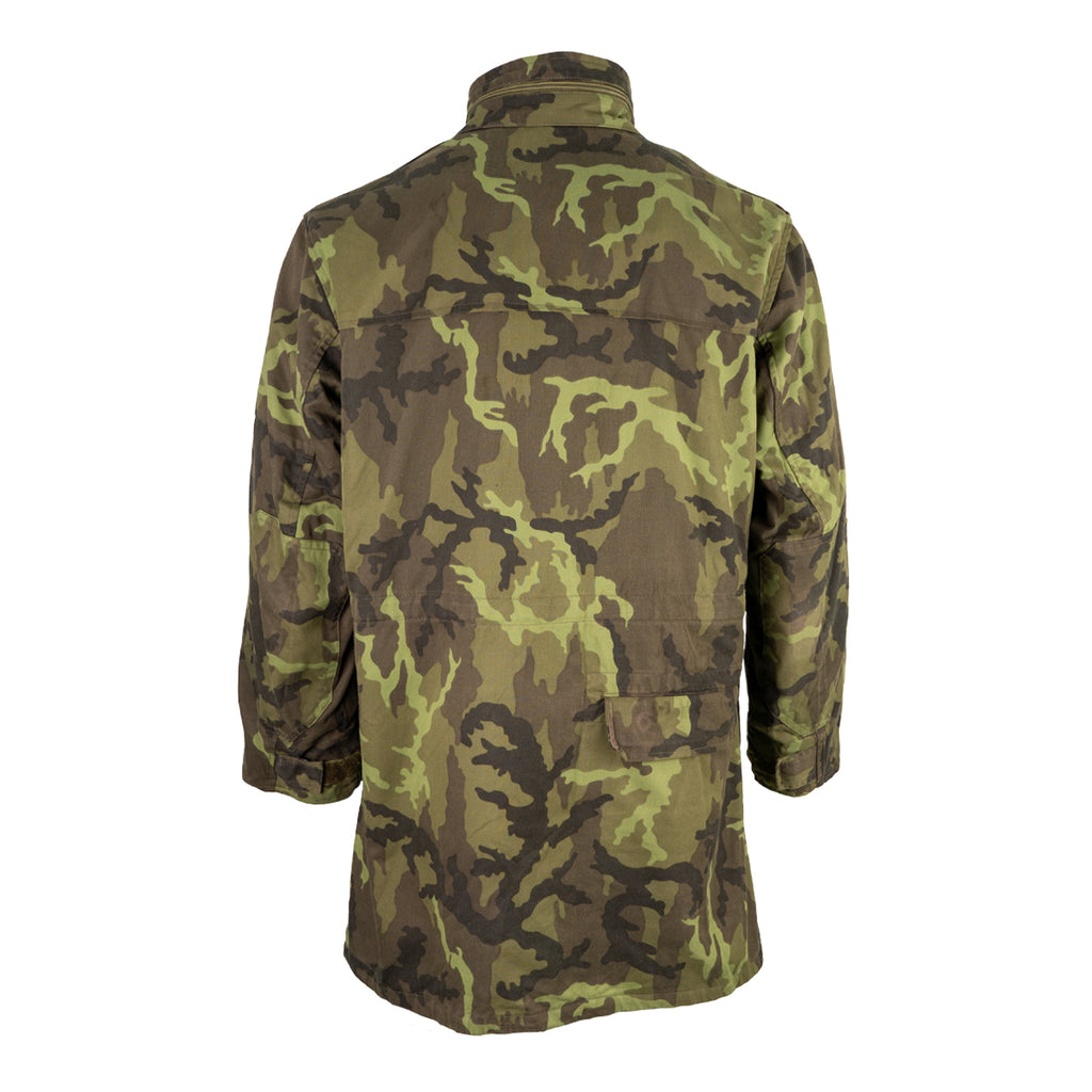 Rear view of the durable Czech Army M95 field jacket featuring woodland camouflage pattern.