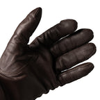 Close-up detail of the durable palm side of a genuine Dutch Army leather glove with stitching and textured finish.