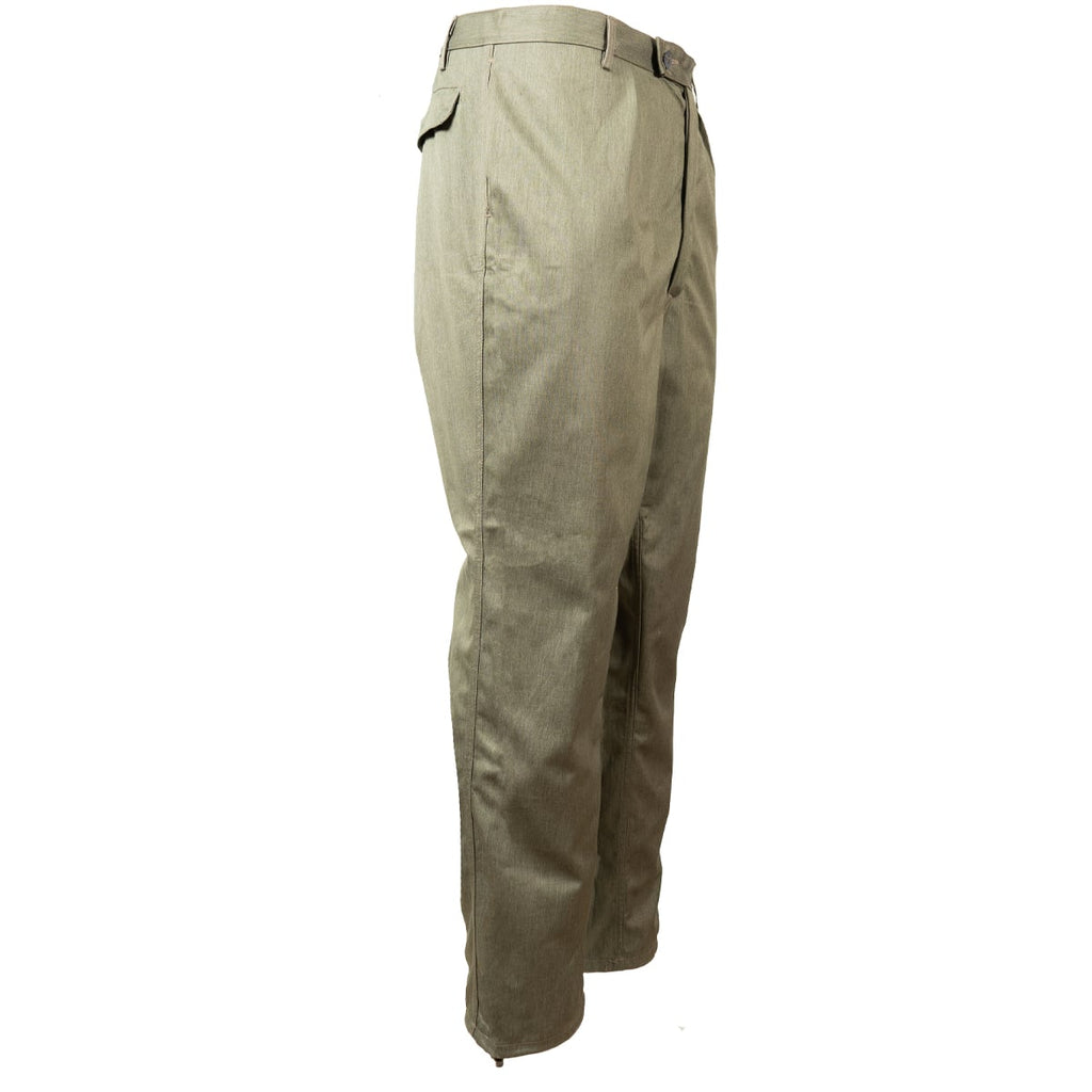 Side profile of original East German NVA military combat trousers, showing durable field fabric and rear pocket placement.