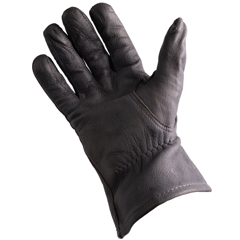 Close-up of the palm side of a German Army surplus leather glove with stitched construction and elasticated wrist.