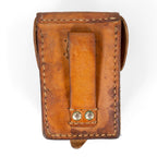 Rear view of the vintage Serbian military leather pouch showing the belt attachment strap and reinforced metal rivets.