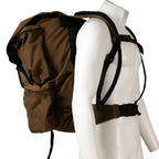 Side profile of the South African military Pattern 83 rucksack showing S-shaped padded shoulder straps and the integrated padded kidney belt.