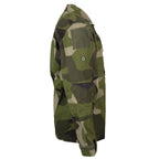 Side profile of the Swedish M90 field shirt featuring durable cotton fabric, shoulder patch area, and sleeve button detail.