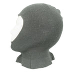 Side view of a vintage Swiss military wool balaclava on a mannequin head, highlighting the thick knit and protective neck design.