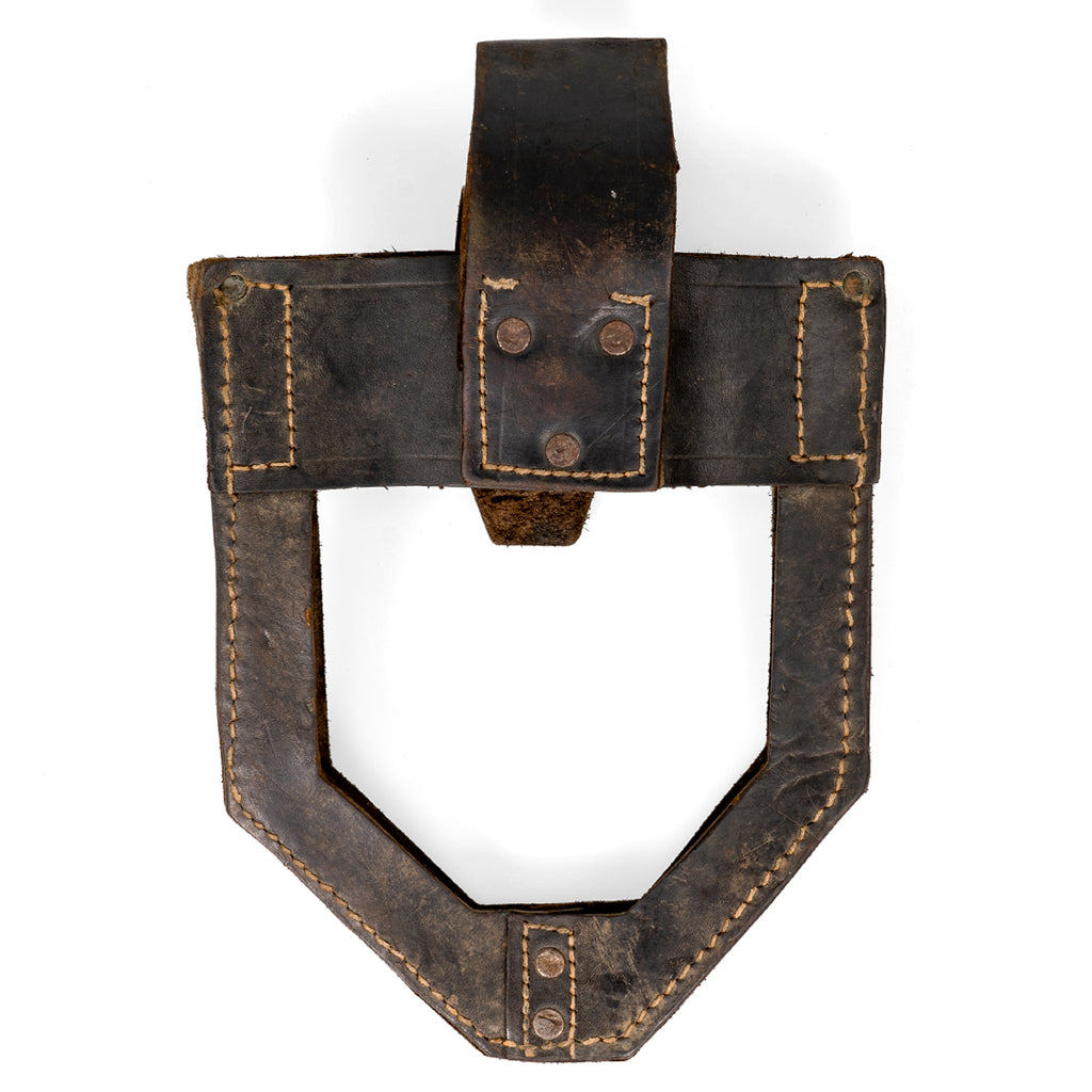 Rear view of the black leather JNA shovel cover for a US M1943 shovel, showing the integrated belt loop and heavy-duty leather construction for field use.