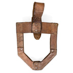 Rear view of the brown leather Yugoslavian shovel cover showing the central strap, belt attachment, and rugged post-war military surplus construction.