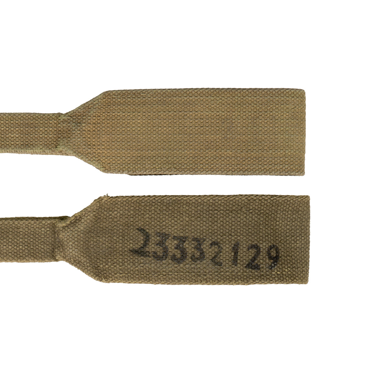 Detailed shot of a 37 Pattern strap featuring the service number 23332129 stamped on the canvas.