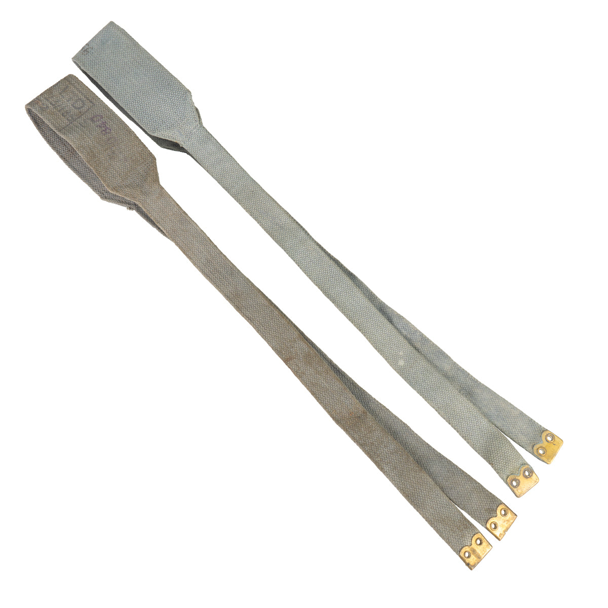 Two grey canvas 37 Pattern cross straps laid flat, showcasing the durable material and brass ends.