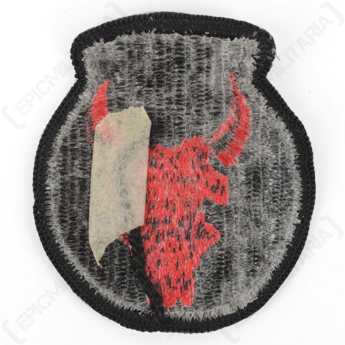 Reverse side of original US 34th Infantry Division shoulder patch showing thread backing