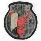 Reverse side of original US 34th Infantry Division shoulder patch showing thread backing