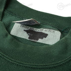 Interior collar and Lycée Militaire Autun tag of green French military jumper