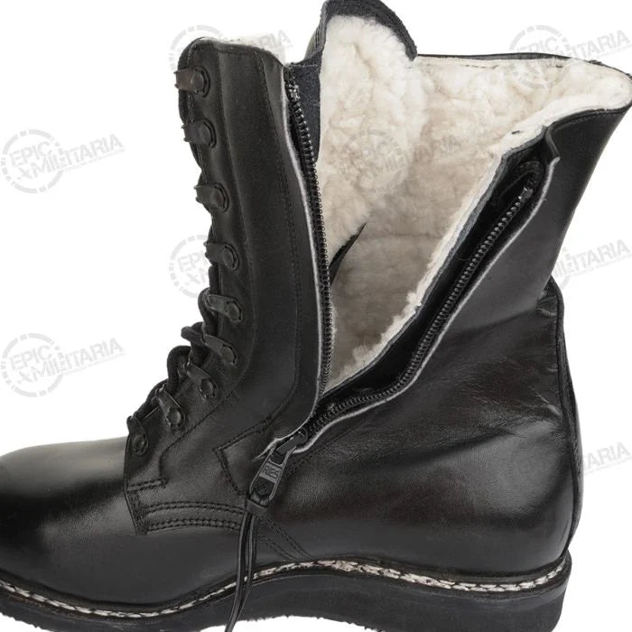 Close-up of open side zip revealing thick white sheepskin lambskin lining inside German pilot boot