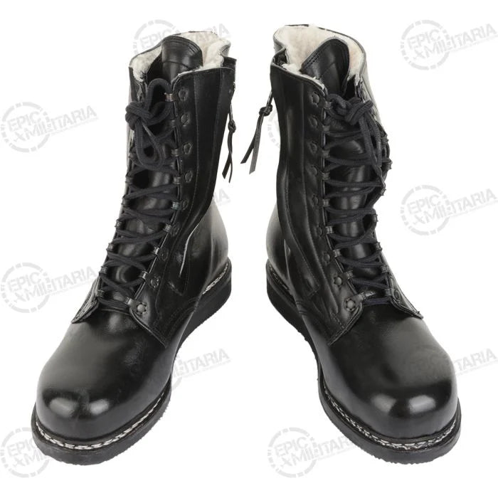 Pair of original German winter pilots boots showing front lacing and side zip closure