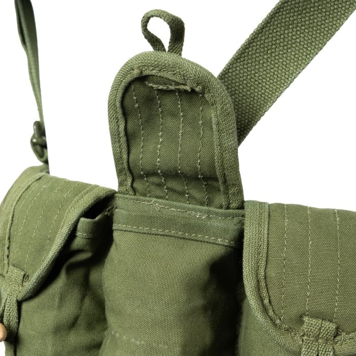 Close-up of an open pocket flap showing the durable cotton canvas lining on the Chicom rig