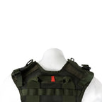 Close-up of the reinforced extraction drag handle on the upper back mesh of the Dutch military surplus vest